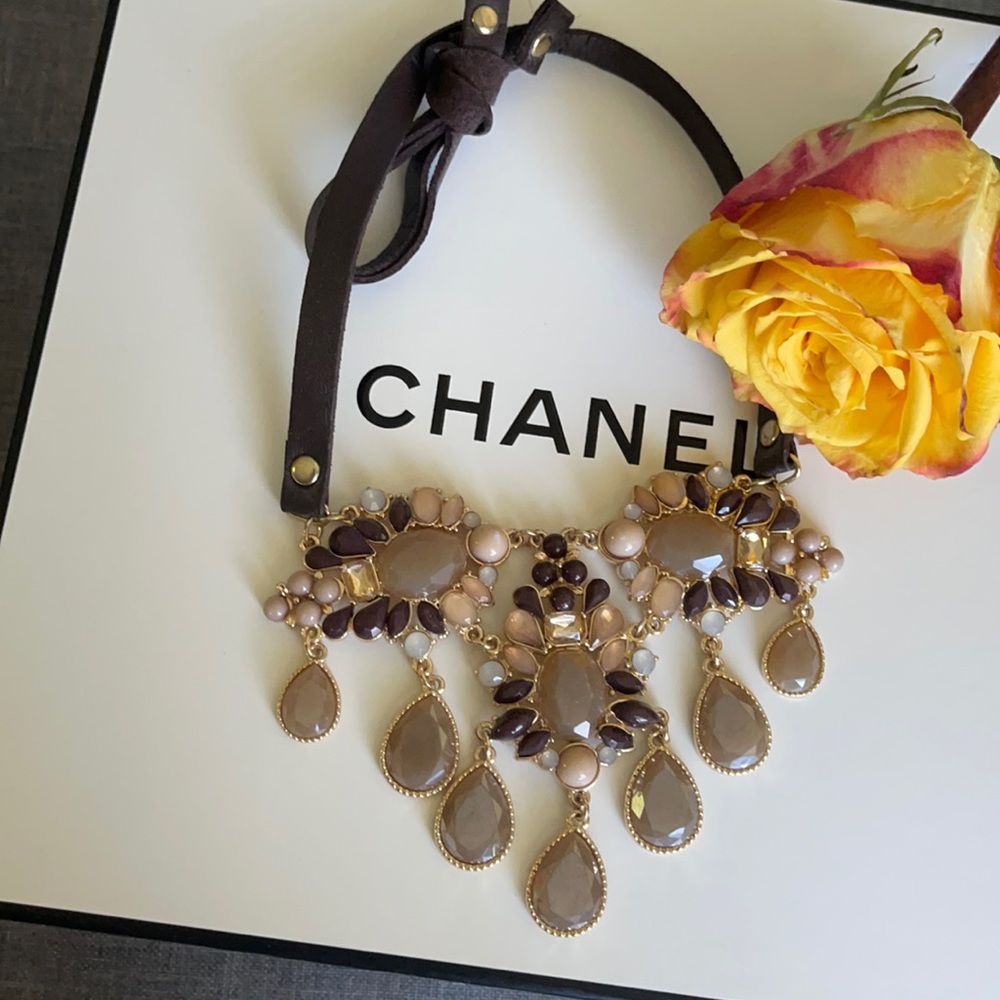 Fashion jewelry necklace with brown leather tie